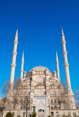 Fototapeta na wymiar Sabanci Central Mosque in Adana, Seyhan city of Turkey with blue sky with mosque minarets. 