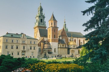 view of the Wawel Hill with the cathedral, visible towers and the gold-plated dome of the Sigismund Chapel, in the church, buried Polish kings and the ruler of the Polish-Lithuanian Commonwealth