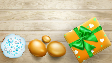 Realistic golden Easter eggs, tasty cake and beautiful gift box with bow on wooden planks