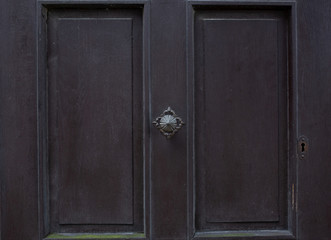 Vintage door knob on an old painted door