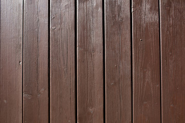 Fototapeta premium Fragment of painted wood door made from straps