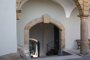 Concrete arch at the entrance of building