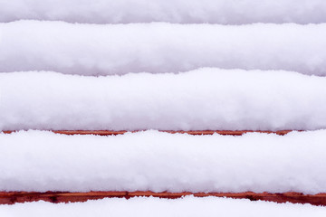 background - snow on a bench