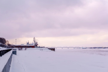 frozen river, cargo port and quay
