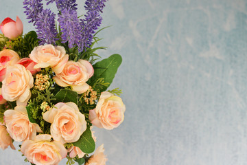 a bouquet with pink roses flowers on a lighl background 
