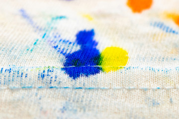 Naklejka premium Stains on fabric macro shot. Clothes before washing. Clipart for advertising detergents