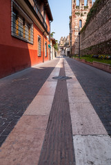 Fototapeta premium Lazise, Italy. Pedestrian street that runs along the ancient walls