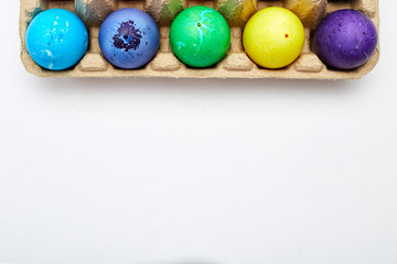 Colorful Easter eggs in box