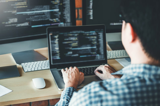 Developing programmer Development Website design and coding technologies working in software company office