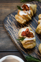 Baked potato with bacon and fresh yogurt
