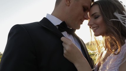 Wedding couple. Lovely groom and bride.  Happy family. Man and woman in love. Wedding day. Slow motion	
