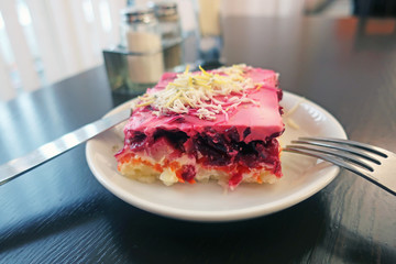 Salad herring under a fur coat on the table