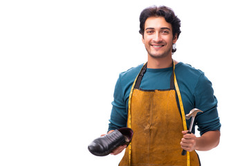 Young handsome shoemaker isolated on white
