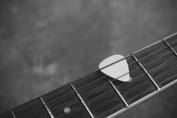 Part of acoustic guitar for backgrounds or textures.