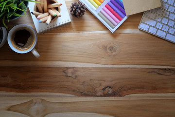 Office desk table with set of colorful supplies, computer and copy space