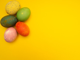 Colorful Easter Eggs On Yellow Background