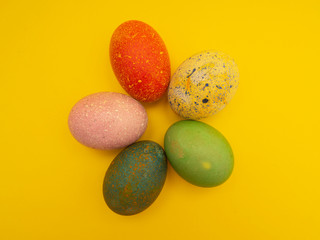 Colorful Easter Eggs On Yellow Background