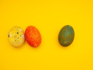 Colorful Easter Eggs On Yellow Background