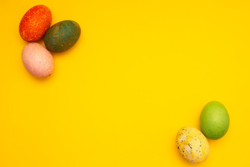 Colorful Easter Eggs On Yellow Background