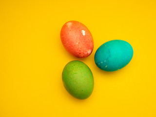 Colorful Easter Eggs On Yellow Background