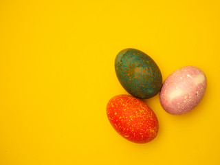 Colorful Easter Eggs On Yellow Background