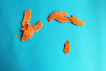 dried fruits mango orange blue bright background