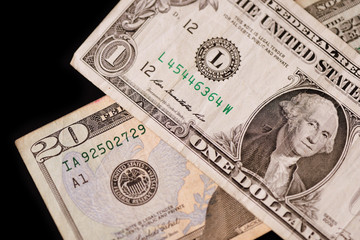 American dollars on a dark background. Brown color toned