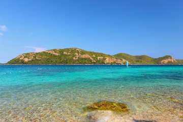 Fototapeta na wymiar Beautiful seascape photo of island near Koh Kham Island with tropical clear turquoise sea water in gulf of Thailand