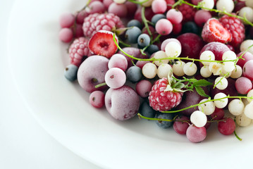 frozen berries on the white plate