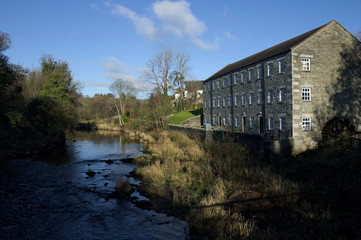 Fototapeta na wymiar The Mill on the Fleet on the River Fleet at Gatehouse of Fleet, Dumfries and Galloway, Scotland.