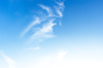 Naklejka na ściany i meble World Environment Day concept: white fluffy clouds in the blue sky