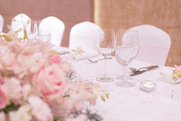 decoration soft pink flower for dinner table with wine glass cup
