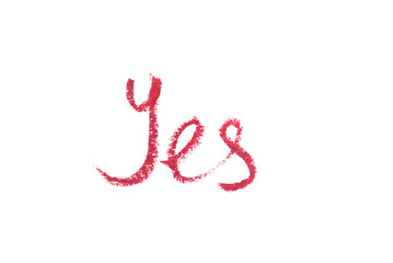 Word yes written with lipstick and isolated on white.