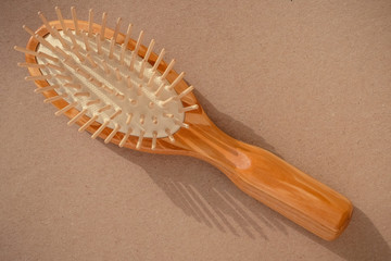 Hairbrush with wooden grip, close up