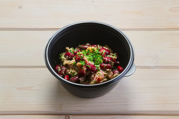 Salad with red beans and tuna in take away packaging