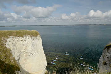 Kayaks beneath Old Harry Rocks on Dorset coast