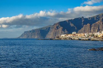 Naklejka premium Los Gigantes cliffs and buildings in Tenerife
