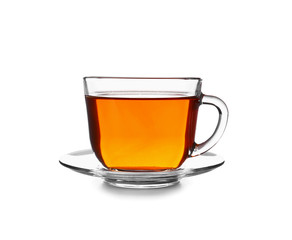 Cup of tasty hot tea on white background