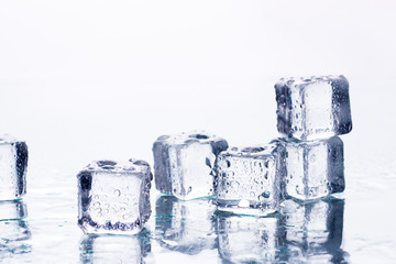 Ice cubes on a white background. Cooling Concept, Food Ice