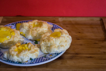 Four pieces eggs, omelette breakfast, morning food, yellow color, wood desk