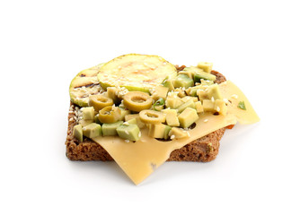 Tasty sandwich with avocado, vegetables and cheese on white background