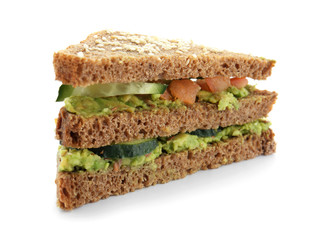 Tasty sandwich with avocado and vegetables on white background