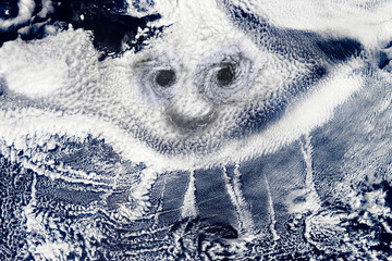 Smile face cloud droplets form. Ship tracks clouds form water vapor condenses around the tiny...