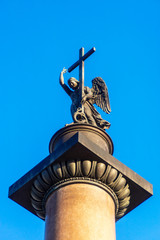 Fototapeta na wymiar Statue of winged angel on top of Alexander Column, in St. Petersburg