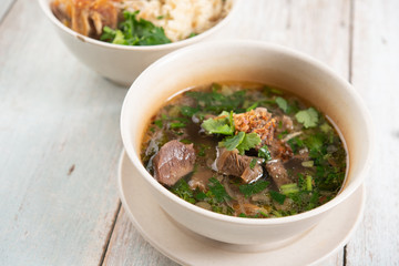 Bone soup in bowl.