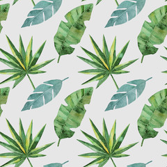 Seamless pattern with green tropical palm and monstera leaves. Exotic and jungle trendy style. Hand drawn watercolor illustration. Exotic hawaiian summer design for print, printing on paper or fabric