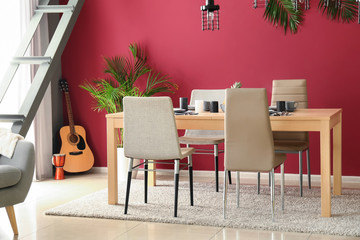 Beautiful table setting in interior of room