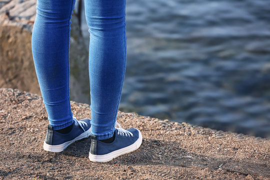 Young woman is going to commit suicide near river