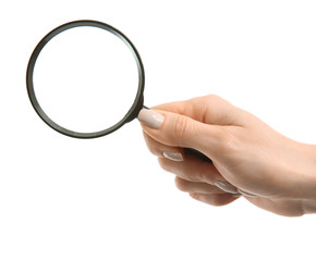 Female hand with magnifier on white background