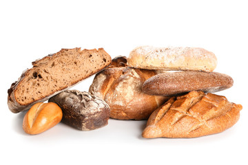 Assortment of tasty bread on white background
